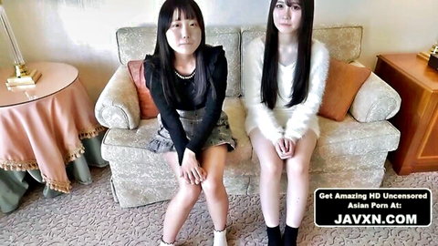 Two hot Japanese amateur babes in skirts and stockings sitting seductively