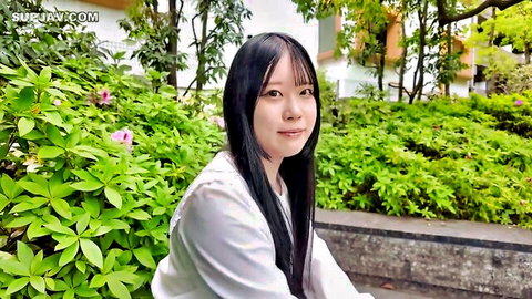 19-year-old Japanese idol Sakura-chan smiling in white blouse outdoors