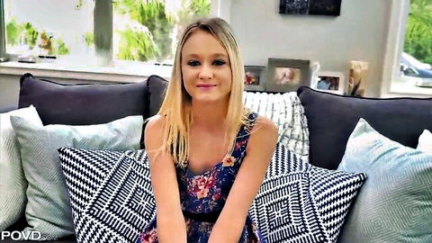 Blonde babysitter Kenzie Kai smiling in floral dress, POV tease