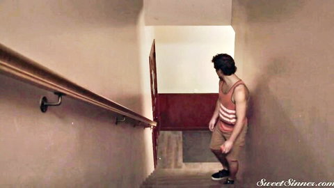 Silvia Saige as busty MILF seducing young stud in hallway stairs