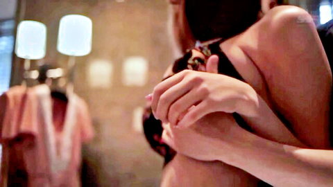 Curvy Japanese MILF in passionate rear embrace during erotic encounter