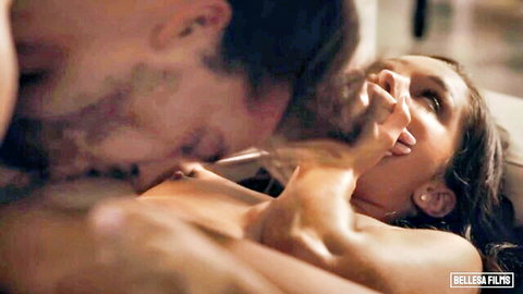 Muscular man passionately kissing petite brunette's neck while groping her small perky tits