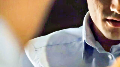 Close-up of handsome Asian man with mustache and short hair opening mouth wide in blue collared shirt