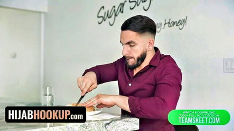 Peter Green cutting food in teasing kitchen scene from Hijab Hookup