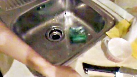 Pungent platinum-blonde stunner in kitchen sink plunge scene