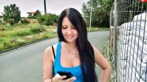 CaroCream taking sexy outdoor selfie in low-cut blue tank top