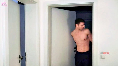 Muscular shirtless hunk leans in doorway, teasing secret encounter with Anna Lena Sofia