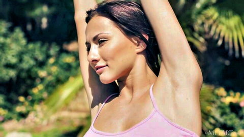 Brunette stretches arms up in tight pink tank top showing cleavage and armpits outdoors