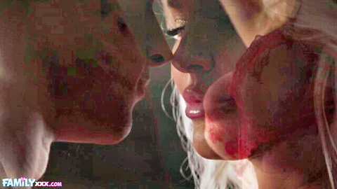 Jenna Starr in intimate lesbian kiss with blonde partner