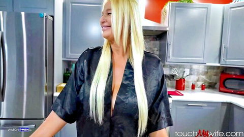 London River in open black silk robe, teasing with deep cleavage