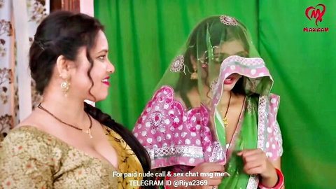 Two busty Desi women in revealing sarees and veil for hot Indian web series