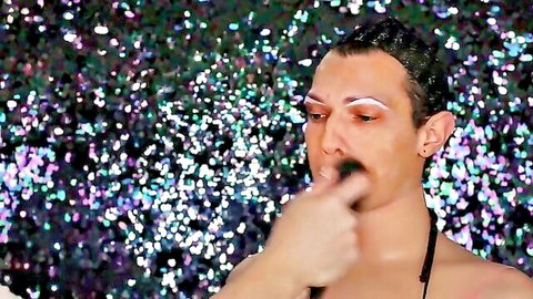Drag transformation as LeeAnne Locken with bold makeup and shirtless pose