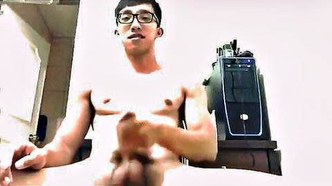 Shirtless muscular Taiwanese guy stroking in solo gay porn