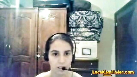 Arab webcam amateur girl with headset chatting solo on cam