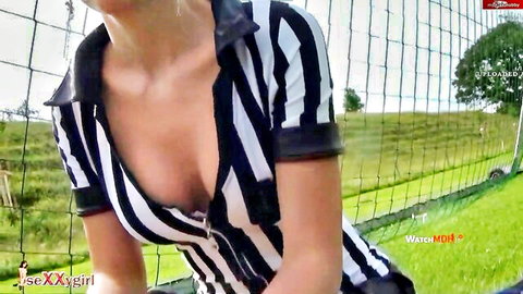 seXXygirl in sexy black and white referee outfit with deep cleavage outdoors