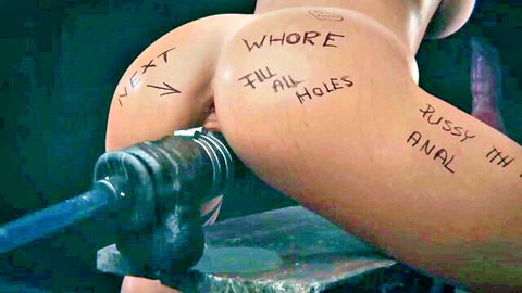 Lara Croft cosplay slave bent over, strapon anal penetration with humiliating body writing