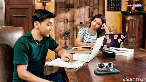 Hailey Rose and guy studying at desk, teasing research folder vibe
