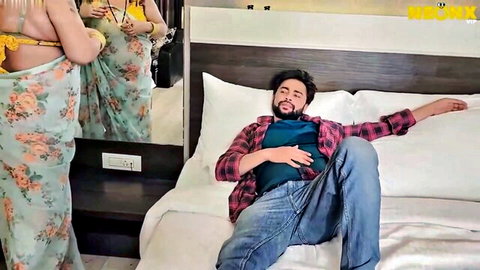 Desi MILF grandmother in revealing saree with man on bed, hot threesome tease