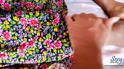 Tamil village girl in colorful floral dress touched intimately by hands