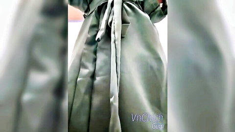 Eira2004 in silky green robe, back view during naughty livestream tease