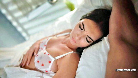 Skinny brunette in see-through heart bra sleeps with black man's arm groping her medium tits on bed
