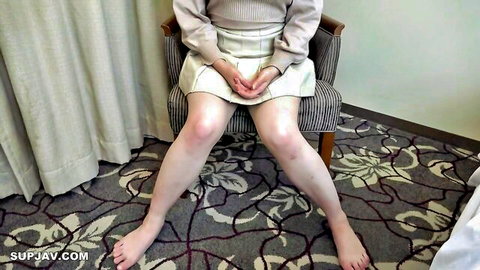 Amateur teen in short white skirt spreads legs wide on chair teasing upskirt view