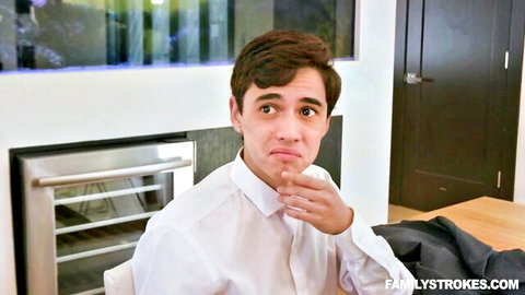 Young Caucasian guy in white shirt ponders thoughtfully in kitchen before Family Strokes fuck