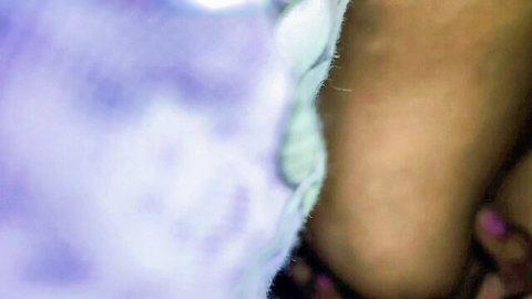 Blurry closeup of Indian woman's big lactating tits with erect nipples leaking milk
