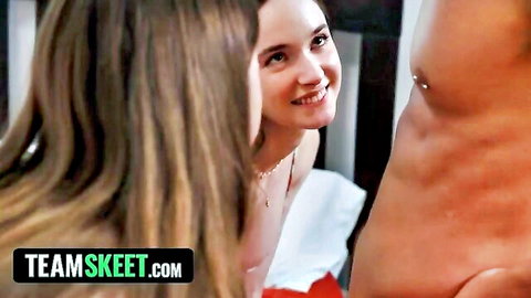 Brunette smiling at shirtless man with nipple piercing in Team Skeet trailer