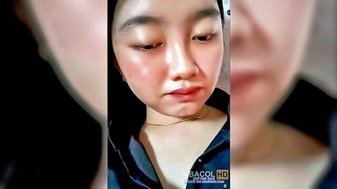 Cute Indonesian teen Nana in open black top, seductive close-up