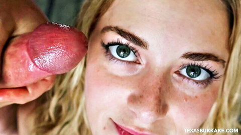 Blonde Claire's close-up facial cumshot with semen on her smiling face