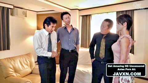 Japanese MILF in pink dress with three suited men at home