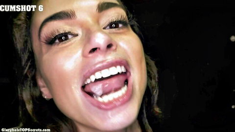 Sophia Burns smiling with cumshot on tongue in Gloryhole Secrets