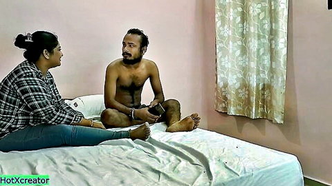 Hot Indian Bengali girl chats with topless guy on bed in hotel
