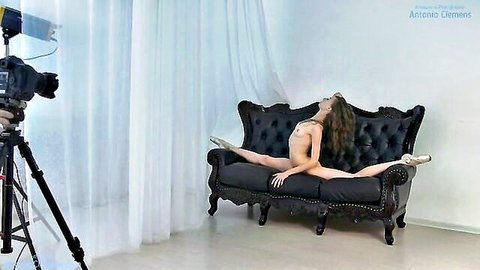 Nude ballerina Annett A. in flexible split on couch