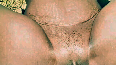 Close-up of hairy asshole spread wide between pale thighs