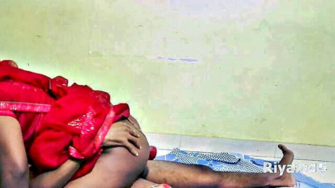Indian couple in red saree fucking doggy style exposing juicy ass and thighs