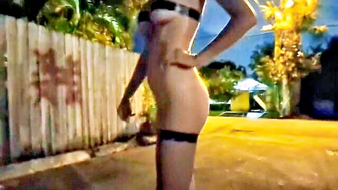 Kitty Longlegs naked stripper walks outdoors in high heels at night