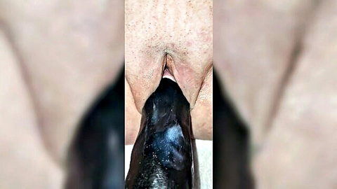 White woman's gaping pussy stretched wide around thick BBC cock penetration