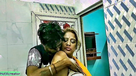 Hot Indian bhabhi in yellow saree embraced by teen devar in intimate hug
