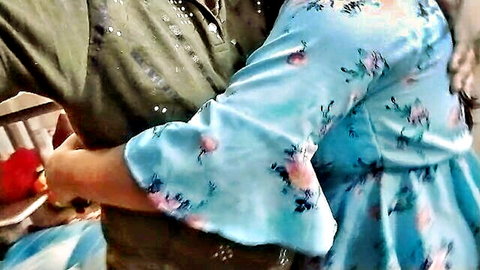 Sexy Desi aunty RiyajiBansalji in blue floral dress embracing servant boyfriend romantically