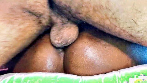 Interracial threesome close-up of black men's genitals and ass in hardcore drilling scene