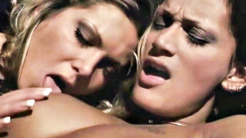 Monica Roccaforte in intense lesbian embrace and kiss