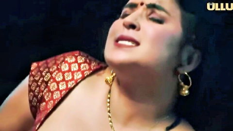 Ecstatic Indian MILF in red saree with slipped blouse exposing side tit in steamy pleasure