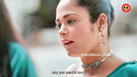 Indian woman in green saree teasing with 'why you want to know' dialogue