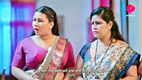 Two curvy Indian women in colorful saris in hot Hindi web series scene