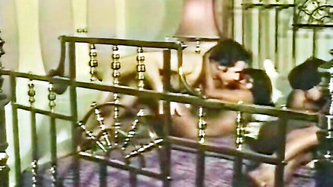 Vintage interracial couple in passionate embrace, nude sex scene