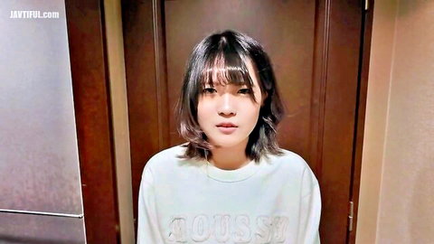 Cute Asian woman in oversized white sweater at door, Japanese amateur training video thumbnail