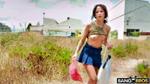 Skinny Asian teen exposes small tits and shaved pussy walking outdoors in mini skirt BangBros