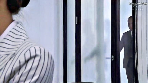 Ryo Ayumi in office shirt glances at suited Toru Ozawa through glass